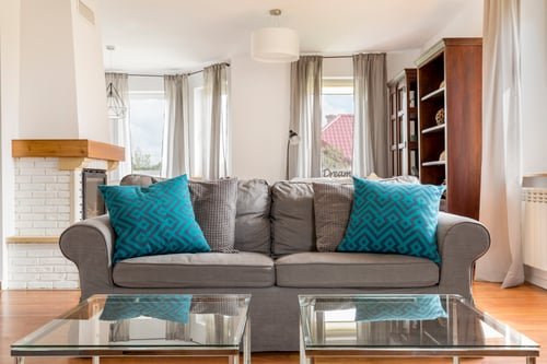 Styled short-term rental living room after professional turnover cleaning